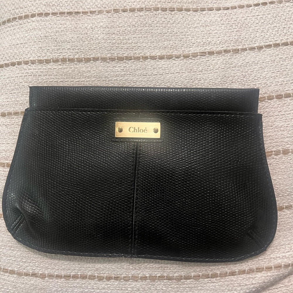 New  Chloe Clutch, small purse. It says Chloe perfumes in the inside.